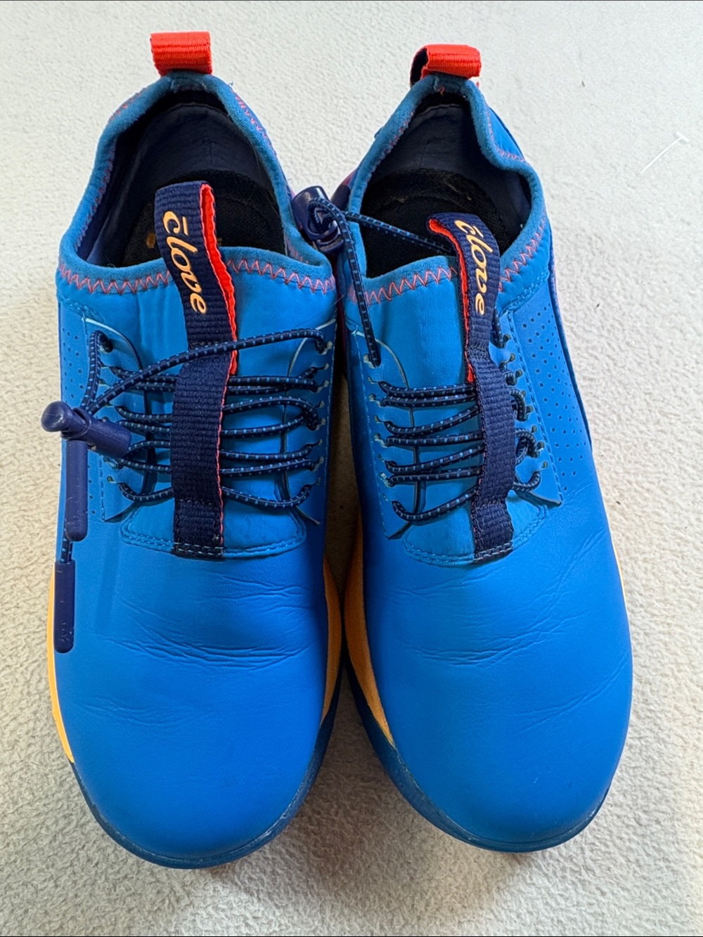 Clove Women's Blue Athletic Slip-On Trainers with Orange Accents